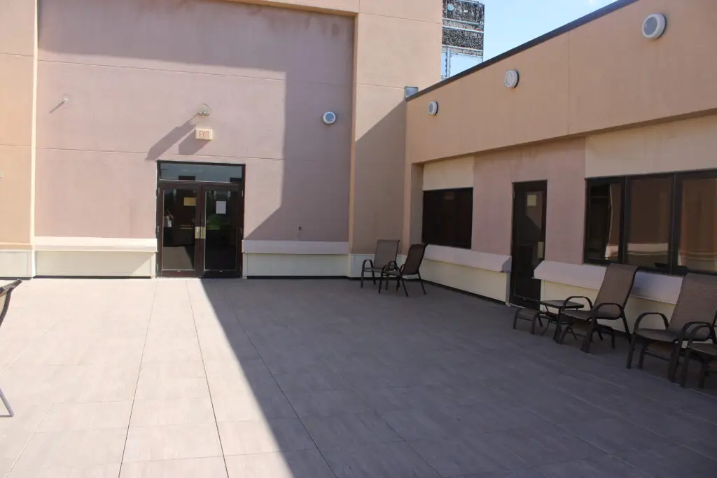 Post construction with paver stone decking at North Bighorn Hospital's New Horizon Care Center completed by Groathouse Construction