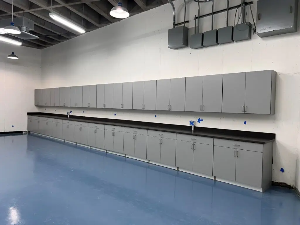 Post renovation of the vault at Buffalo Bill Center of the West Firearms Museum in Cody, Wyoming completed by Groathouse Construction with new epoxy floors and cabinets
