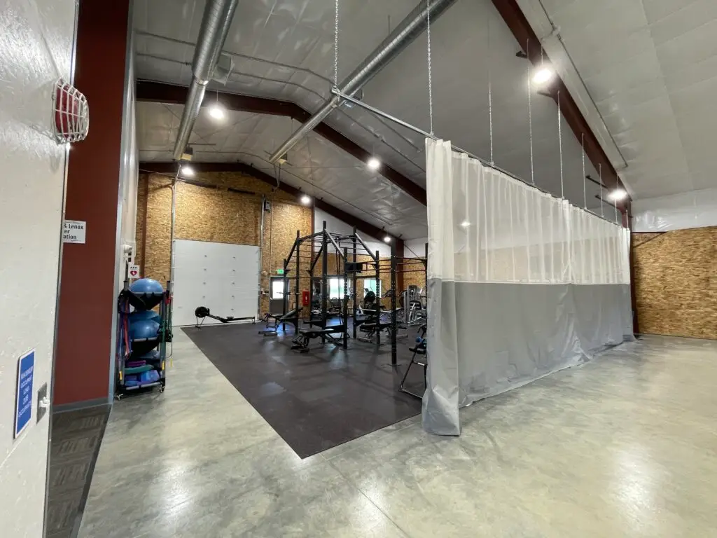 Fitness equipment and recreation area inside Meeteetse Community Center.