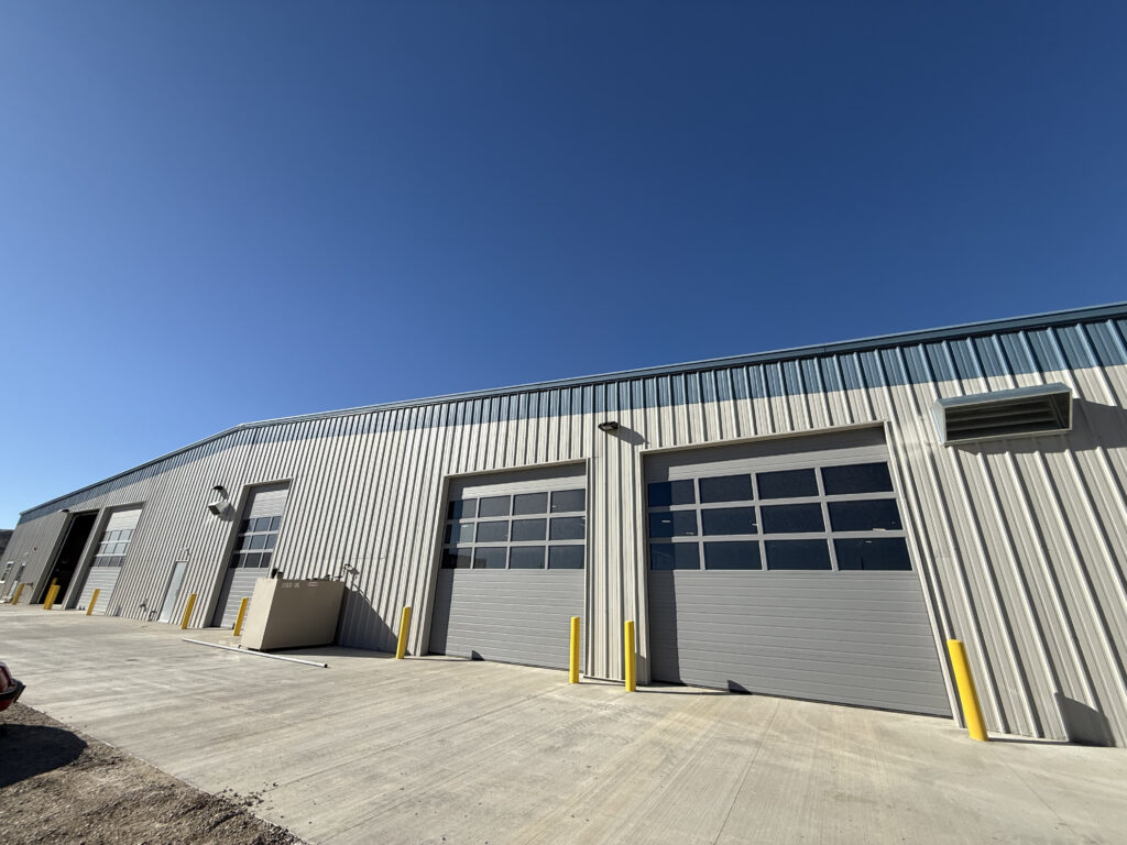Exterior vehicle service bays at Sweetwater County Public Works Combined Facility.